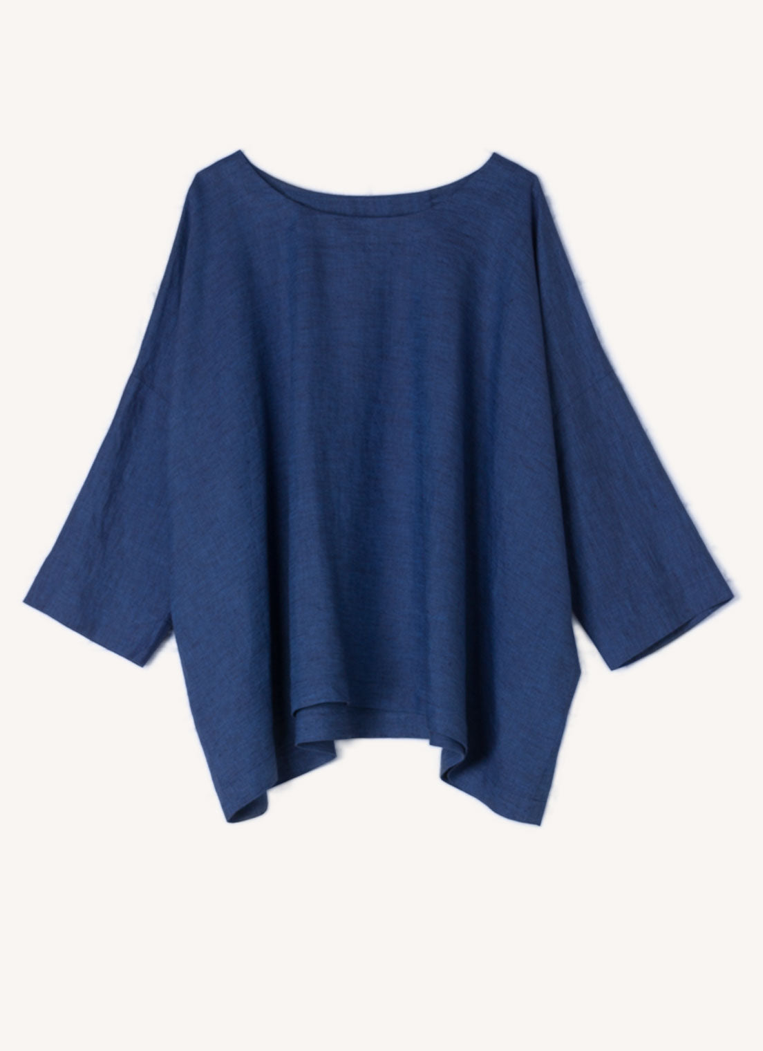 A blue, easy fit top with round neckline, long sleeves and embroidered detail at the back made from European pure linen