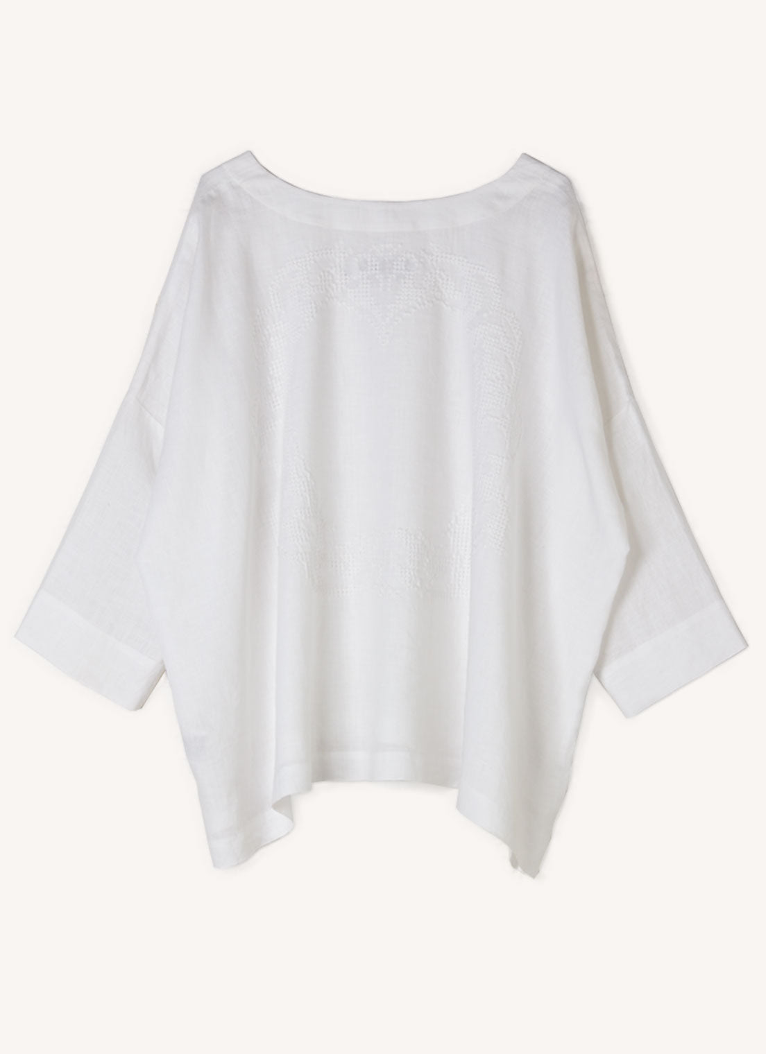A white, easy fit top with round neckline, long sleeves and embroidered detail at the back made from European pure linen