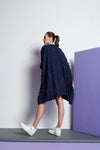 A navy blue easy fit, square cut, knee-length dress made from cotton and linen with round neckline, short sleeves, and striped fringe fabric