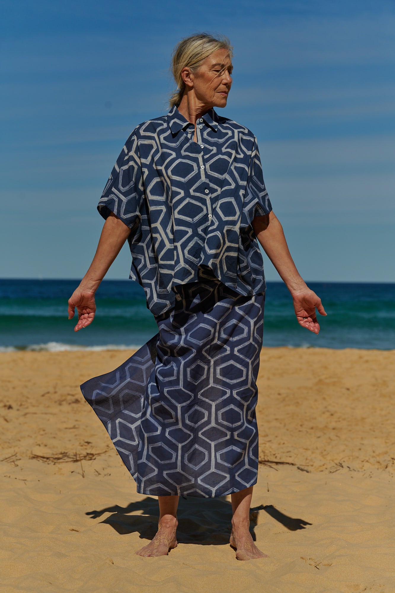 An indigo square-cut cotton shirt hand-dyed using traditional shibori technique