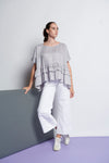 An easy-fit, tiered ruffle linen top with round neckline and short sleeves in very pale blue