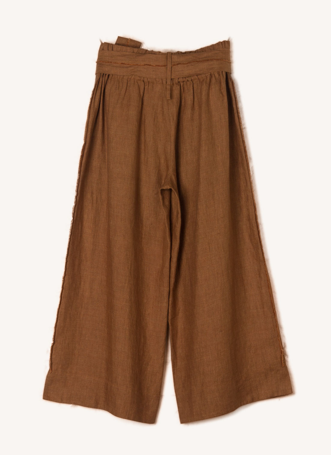 A bronze, loose fitting crop pants with elasticated back waistband, hand frayed detailing and tie belt of the same fabric